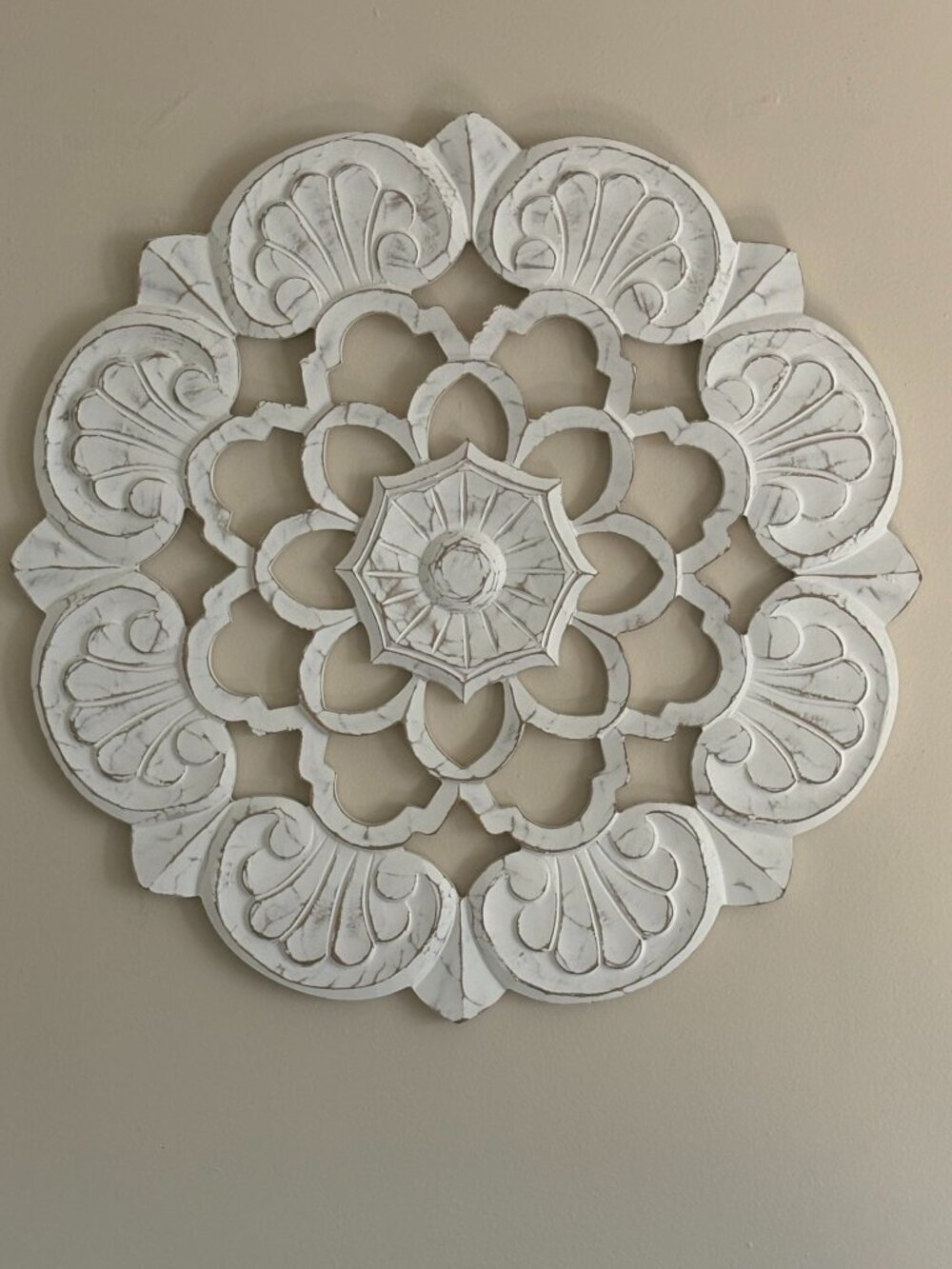 White circular art wall decor